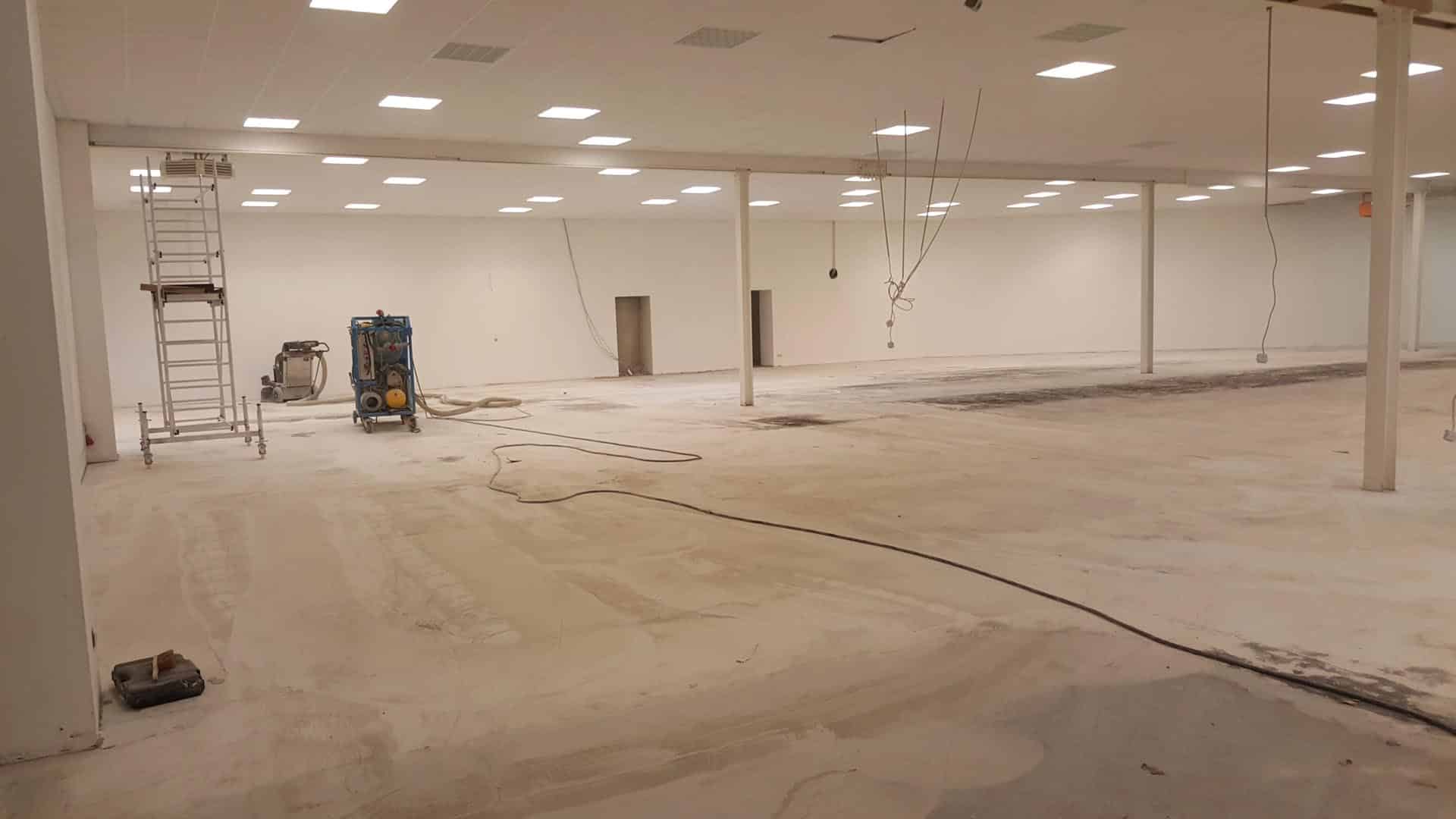 Empty Commercial Space Undergoing Renovation With Construction E